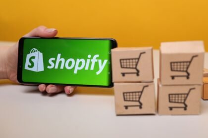 A tablet & phone with successful shopify store partner agency logo