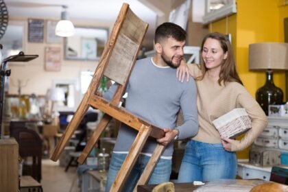 Couple arranging furniture